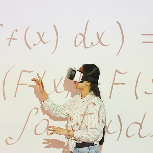 Student working with math equation